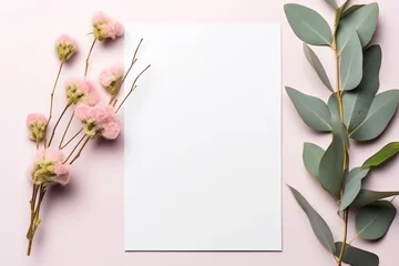 Tuinposter minimal spring flowers and eucalyptus with empty white paper mock up template © Dina