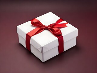 view of white present box tied with red ribbon bow isolated on dark red background Valentine's Day