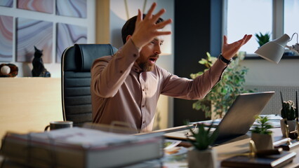 Furious businessman shouting online conference sitting office workspace close up