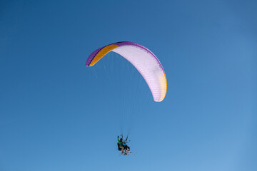Paragliding tandem flights above ski resort. Unique aerial experience from Courchevel to Meribel.
