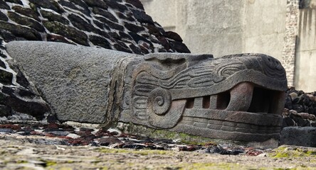 An imposing sculpture depicting a serpent's head, a sacred animal for the Aztec people, in the...