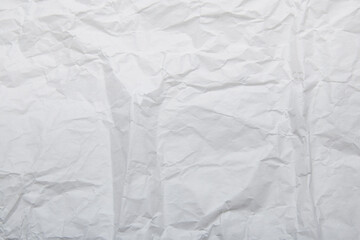 Rustic background of crinkled white paper and copy space
