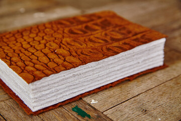 Luxurious Embossed Leather Journal on Wooden Surface