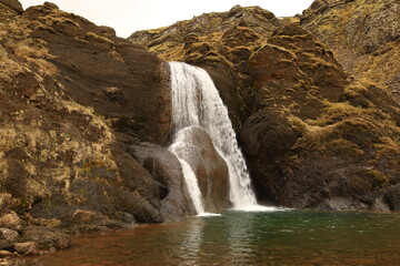 Obraz premium Helgufoss is a waterfall near the capital of Iceland, located in Mosfellsdalur valley