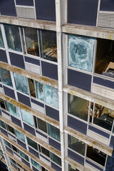 Urban Decay and Window Patterns on an Abandoned Hotel Facade