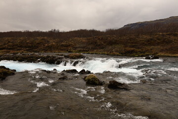 Brúará is a spring-fed river in West Iceland which runs by the boundaries of municipalities Biskupstungur and Grímsnes