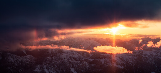 Canadian Mountain Landscape. Dramatic Sunset. Aerial Panorama Nature Background