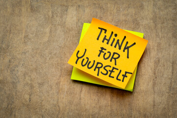Think for yourself reminder or advice - handwriting on a sticky note, personal development concept