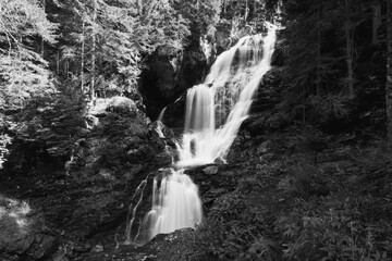 Riesach waterfall in Untertal Valley, Rohrmoos-Untertal in Schladminger Alps, Austria. Black and white photography.