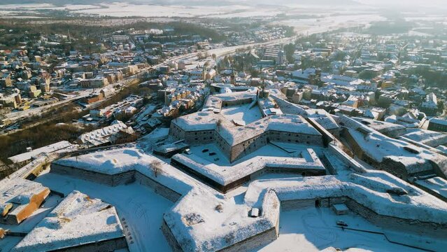 Fortress Klodzko and old town cityscape, aerial view. Famous historical landmark, fortification complex of the Lower Silesian Voivodeship. The biggest stronghold in Prussian Silesia. Winter panorama.