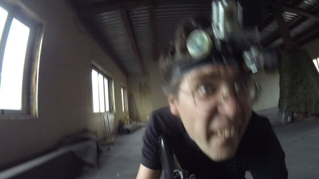 Man makes selfie during lasertag game in Moscow, Russia