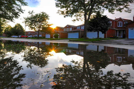 Reflection from pool of water after heavy rainstorm in a residential area in Toronto