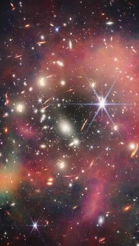 Deep space travel to far away galaxies. Part of the first image from NASA's James Webb Space Telescope has been used. CREDITS: NASA, ESA, CSA, and STScI. Vertical design for smartphone
