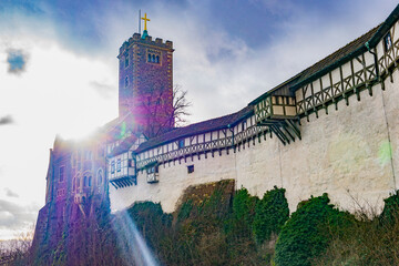 Wartburg with sunlight breaking the clouds