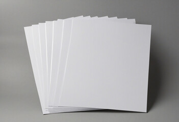 Blank White Paper on Gray Background - obrazy, fototapety, plakaty