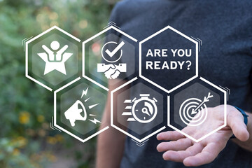 Man using virtual interface sees inscription: ARE YOU READY? Business, marketing and advertising concept. Are you ready?