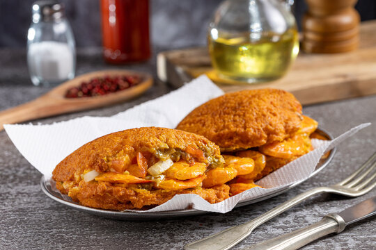 Acaraje. Traditional Brazilian food, made with vatap&aacute;, caruru and dried shrimp.