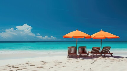 Fototapeta premium Vacation holidays background wallpaper - two beach lounge chairs under tent on beach