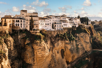 Fototapeta na wymiar View of the old town of Ronda, Spain and of the Tajo Gorge. Inhabited by Celts, Phoenicians and Arabs, the city was reconquered by the Catholic Monarchs in 1485.