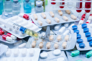 Blister of medicines of different formats along with a syringe and vials