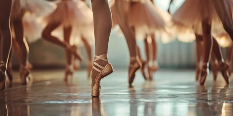 Gordijnen Young ballerinas wearing pointe shoes dancing © piai