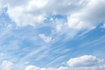 gentle clouds in the blue sky