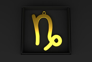 A golden Capricorn zodiac pendant rests in an elegant black box against a black background, exuding...