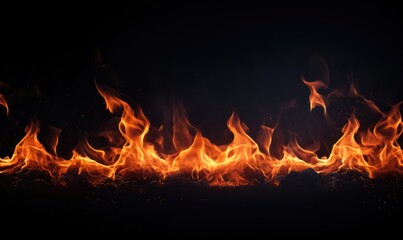 Fire flames isolated on black background. Abstract blaze fire texture background.
