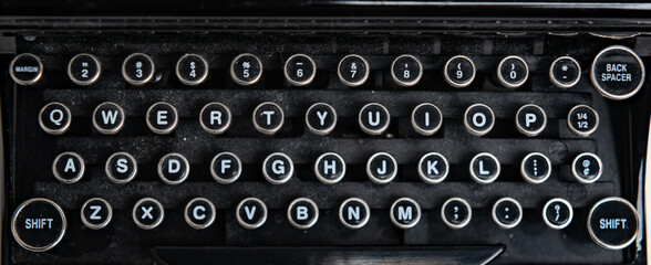 Closeup of an old dusty manual typewriter keyboard