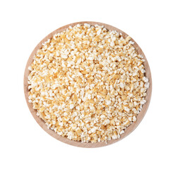 Raw barley groats in bowl isolated on white, top view
