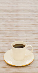 Vertical image of a cup with coffee drink on a plate on a wooden table, rest and food theme