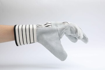 Woman in gardening glove on white background, closeup