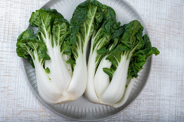 Young organic white bok choy or bak choi Chinese cabbage ready to cook