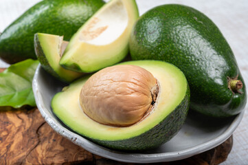 Green ripe avocado fruits from organic avocado plantation - healthy food