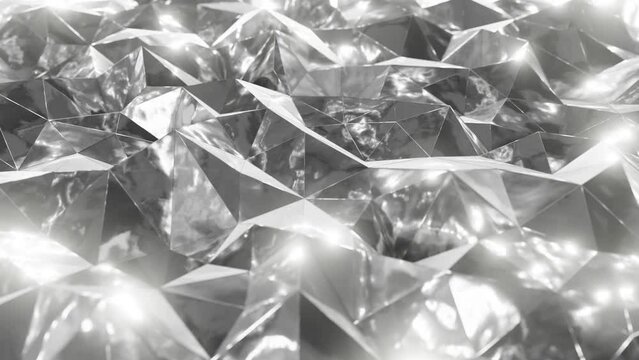 Realistic abstract looping 3D animation of the moving shining glass or crystal polygonal surface rendered in UHD as motion background
