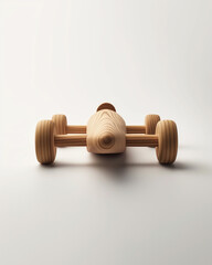 Fototapeta premium retro wooden toy racecar on a white background.