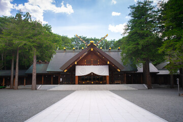 Fototapeta na wymiar Hokkaido Jingu, a Shinto shrine enshrines four spirits including soul of Emperor Meiji and early explorers of Hokkaido such as Mamiya Rinzo, sited in Maruyama Park, Chuo-ku, Sapporo, Hokkaido, Japan