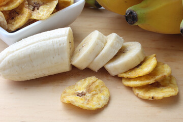 Sliced ​​banana and banana chips isolated.