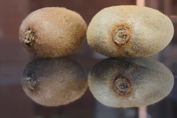 Kiwi fruit on a wooden background