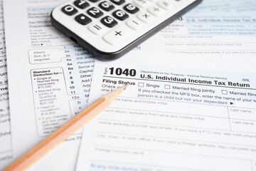 Tax form 1040 U.S. Individual Income Tax Return, business finance concept.
