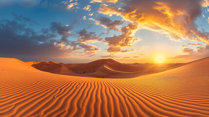 Fototapeta na wymiar Stunning panorama of vast desert landscape with warm light of sunrise