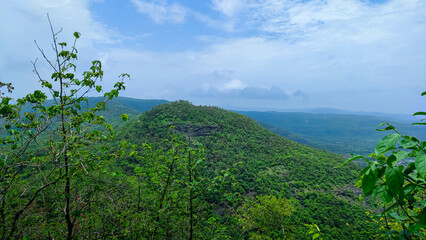 mountain and sky view from the top of the avachitgad fort in maharashtra in India.