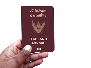 Thailand passport holding in hand