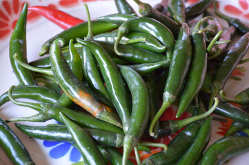 fresh green chili in a basket.