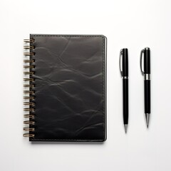 A black notebook in the photo on a gray background with a black pen next to it. generative AI