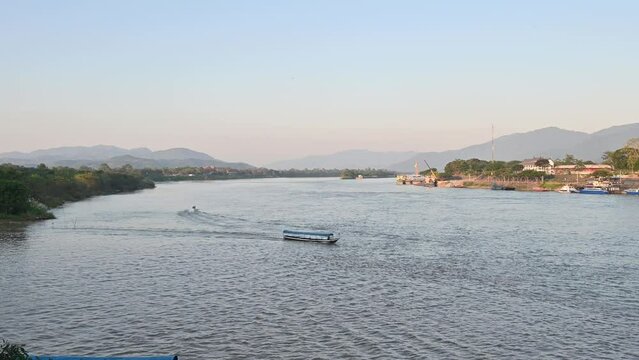 View of the Golden Triangle area where the borders of Thailand, Laos, and Myanmar (Burma) meet at the Ruak and Mekong rivers view from Chiang Saen district in Chiang Rai province of Thailand.