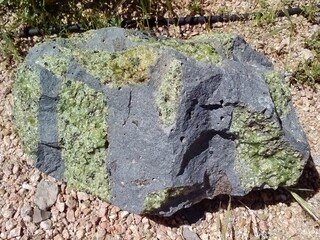 Volcanic rock with the semi-precious gemstone, peridot