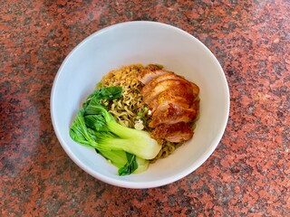 Braised pork Noodles, selective focus. Famous Cantonese style noodles