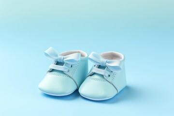 Pair of blue baby shoes on blue background, baby birth card, baby shower, celebration of baby birth, baby products store wallpaper, baby products store advertising