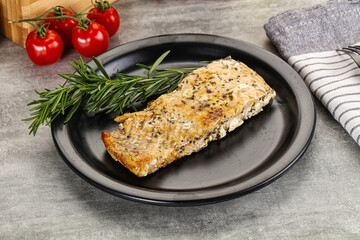 Baked salmon fish served rosemary